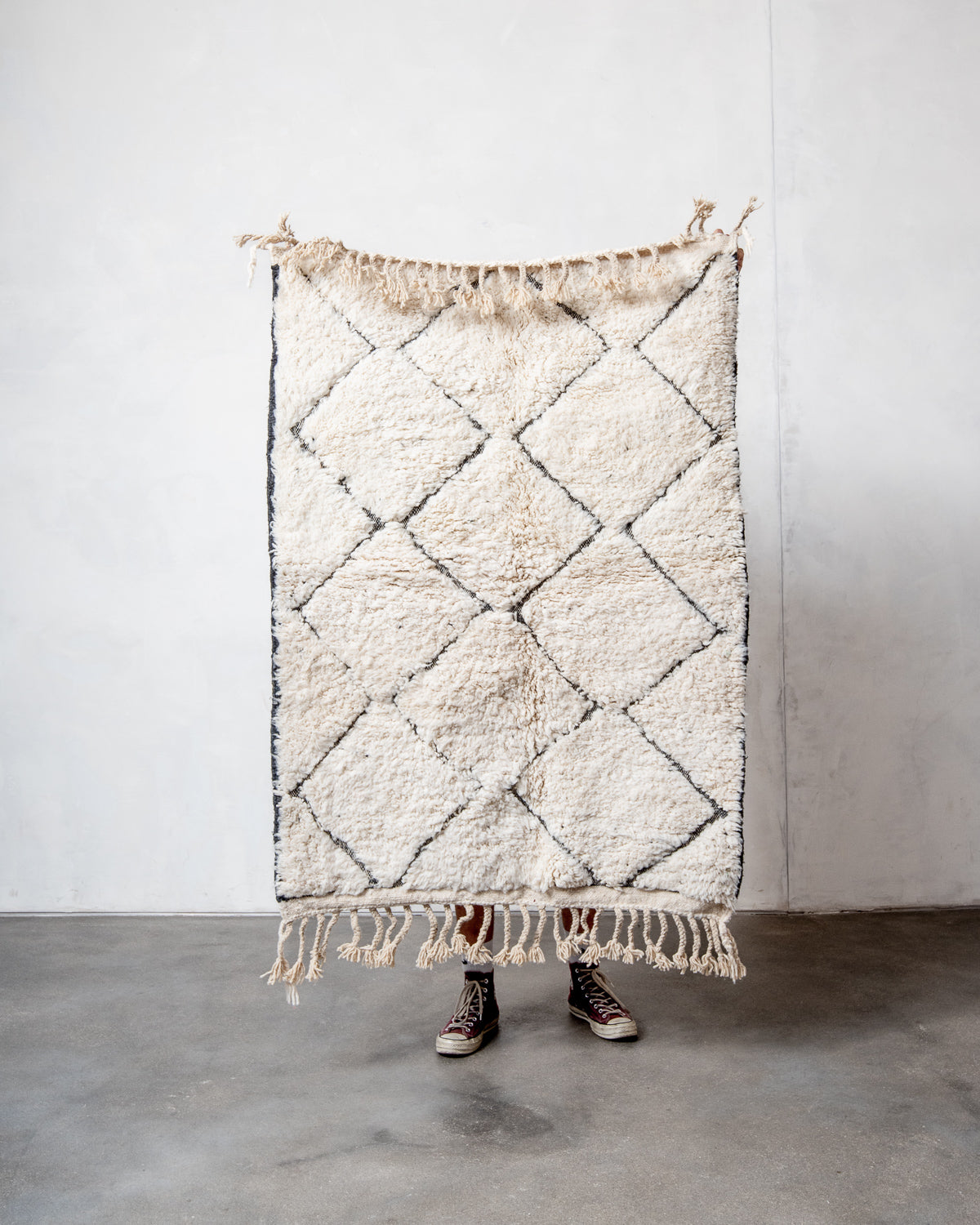 Modern, designer, handcrafted Berber rug from Morocco. Beniourain carpet with minimalist design, natural wool pile and a fluffy texture.