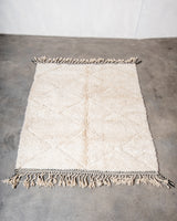 Modern, designer, handcrafted Berber rug from Morocco. Beniourain carpet with minimalist design, natural wool pile and a fluffy texture.