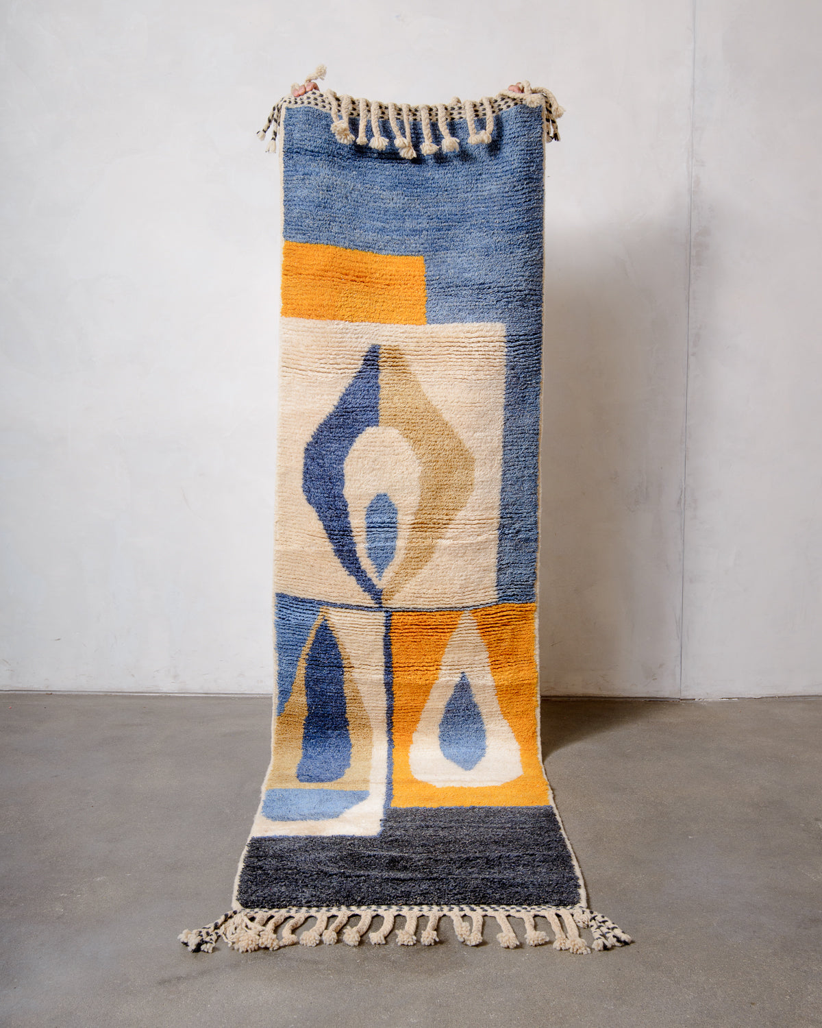 Modern, designer, handcrafted Berber runner rug from Morocco. Beniourain carpet with beautiful colours and patterns and fluffy wool texture.