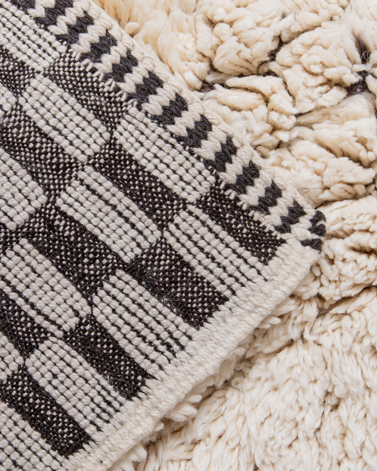 Modern, designer, handcrafted 100% sheep’s wool Berber rug from Morocco. Beni M’rirt carpet with beautiful colours and patterns and fluffy wool texture.