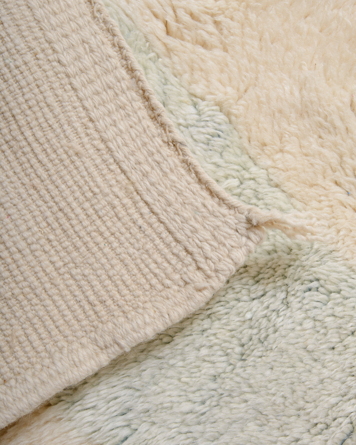 Modern, designer, handcrafted 100% sheep’s wool Berber rug from Morocco. Beni M’rirt carpet with beautiful colours and patterns and fluffy wool texture.