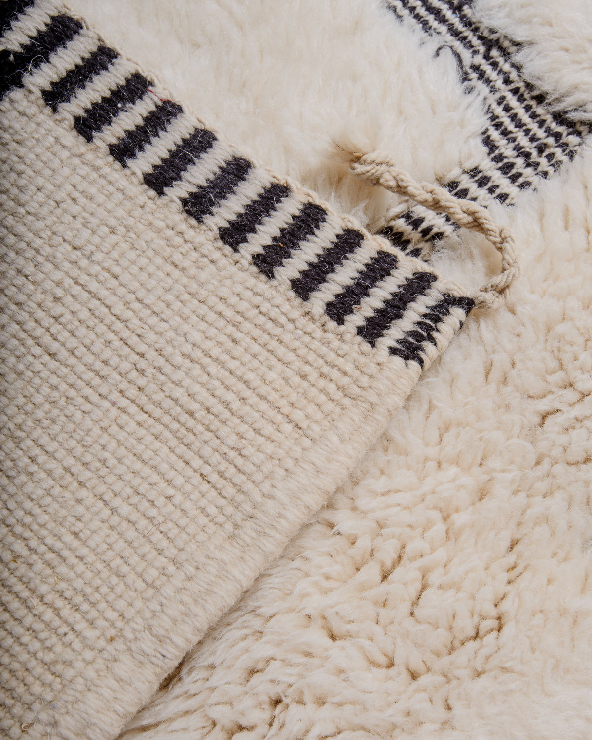 Back of cream M'rirt rug showing the density of the knots.