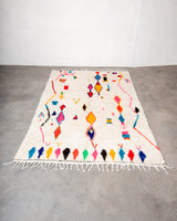 Modern designer handcrafted Berber rug from Morocco. Azilal rug with beautiful colors and patterns. Made of sheep’s wool and colourful cotton.