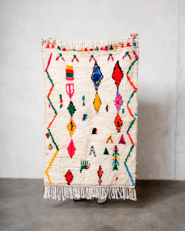 Modern designer handcrafted Berber rug from Morocco. Azilal rug with beautiful colors and patterns. Made of sheep’s wool and colourful cotton.