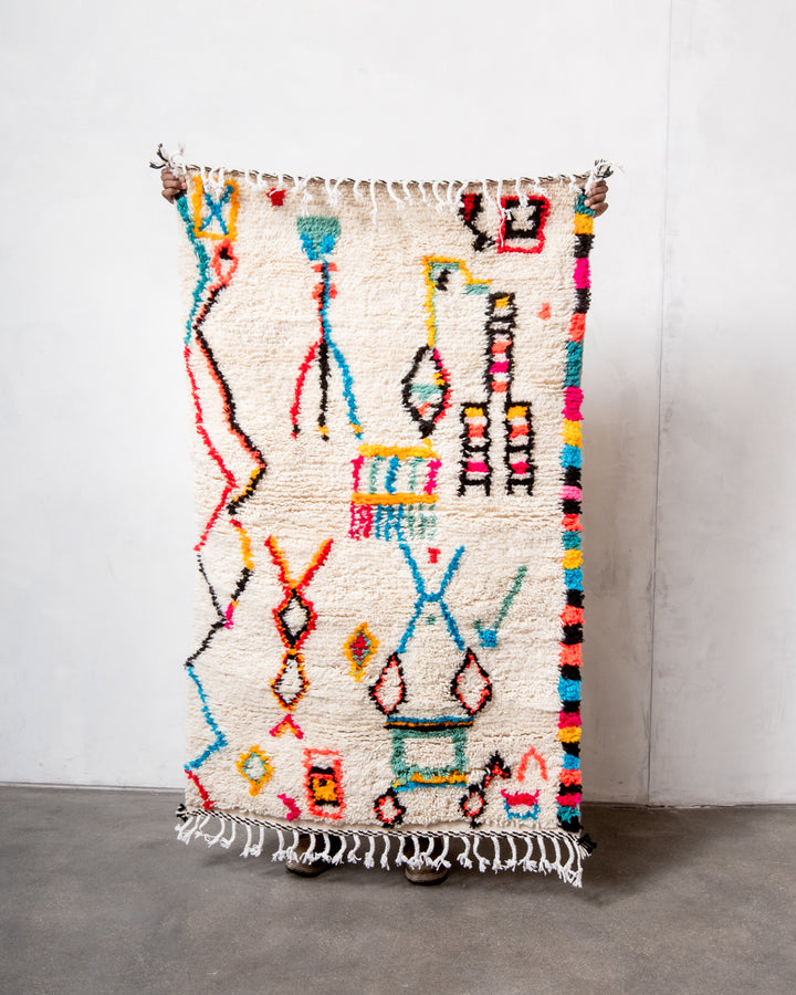 Modern designer handcrafted Berber rug from Morocco. Azilal rug with beautiful colors and patterns. Made of sheep’s wool and colourful cotton.