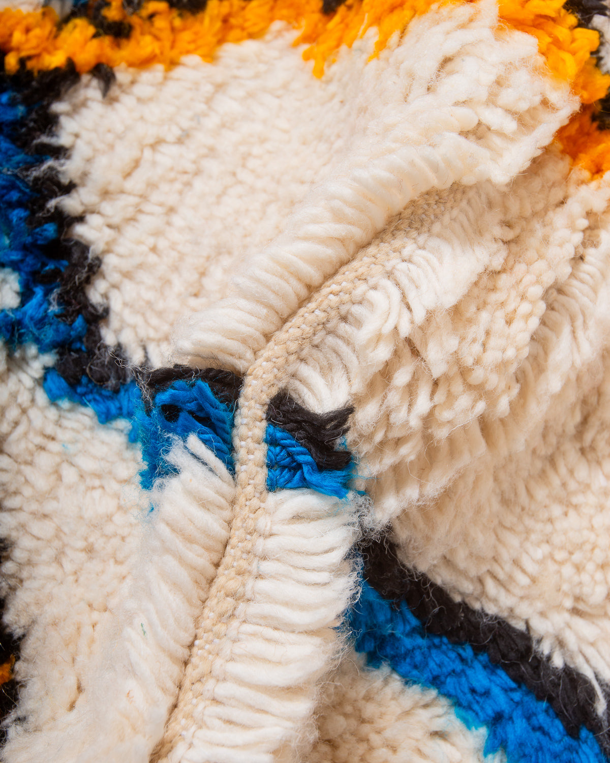 Modern designer handcrafted Berber rug from Morocco. Azilal rug with beautiful colours and patterns. Made of sheep’s wool and colourful cotton.