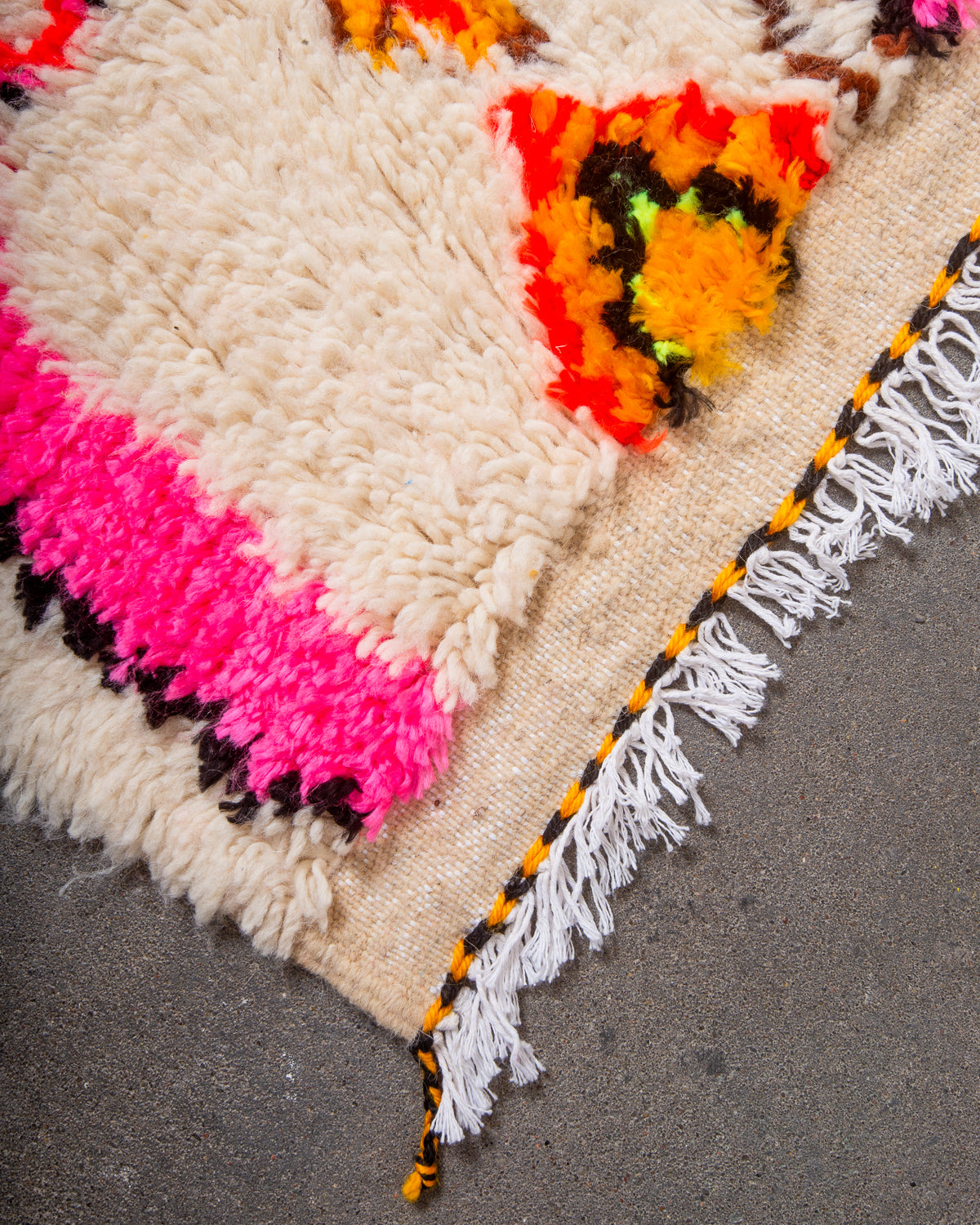 Modern designer handcrafted Berber rug from Morocco. Azilal rug with beautiful colours and patterns. Made of sheep’s wool and colourful cotton.