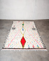 Modern designer handcrafted Berber rug from Morocco. Azilal rug with beautiful colors and patterns. Made of sheep’s wool and colourful cotton.