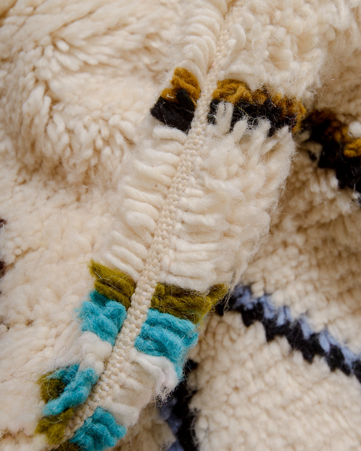 Modern designer handcrafted Berber rug from Morocco. Azilal rug with beautiful colours and patterns. Made of sheep’s wool and cotton.