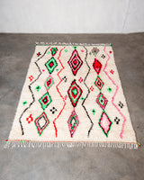 Modern designer handcrafted Berber rug from Morocco. Azilal rug with beautiful colors and patterns. Made of sheep’s wool and colourful cotton.