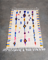 Modern designer handcrafted Berber rug from Morocco. Azilal rug with beautiful colors and patterns. Made of sheep’s wool and colourful cotton.