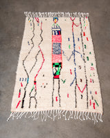 Modern designer handcrafted Berber rug from morocco Azilal with beautiful colors and patterns.