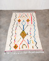 Modern designer handcrafted Berber rug from Morocco. Azilal rug with beautiful colors and patterns. Made of sheep’s wool and colourful cotton.