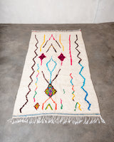 Modern designer handcrafted Berber rug from Morocco. Azilal rug with beautiful colors and patterns. Made of sheep’s wool and colourful cotton.