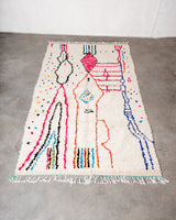 Modern designer handcrafted Berber rug from Morocco. Azilal rug with beautiful colors and patterns. Made of sheep’s wool and colourful cotton.