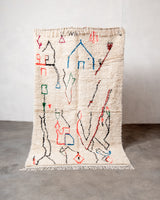 Modern designer handcrafted Berber rug from Morocco. Azilal rug with beautiful colors and patterns. Made of sheep’s wool and colourful cotton.