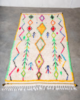 Modern designer handcrafted Berber rug from Morocco. Azilal rug with beautiful colors and patterns. Made of sheep’s wool and colourful cotton.