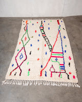 Modern designer handcrafted Berber rug from Morocco. Azilal rug with beautiful colors and patterns. Made of sheep’s wool and colourful cotton.