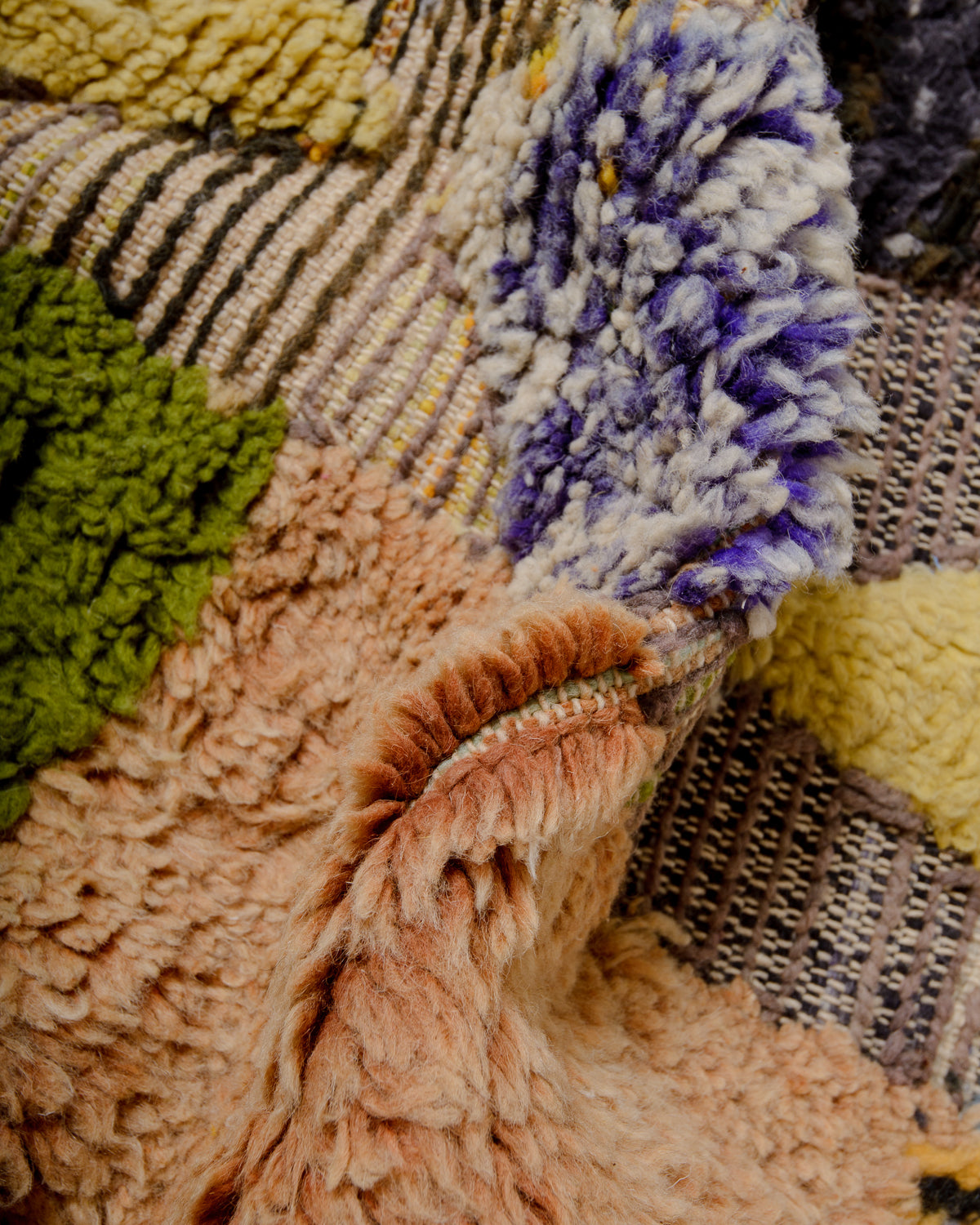 Modern, designer, handcrafted Berber rug from Morocco. Beniourain carpet with beautiful colours and patterns and fluffy wool texture.