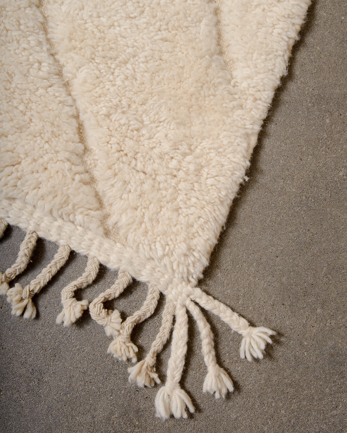 Modern, designer, handcrafted Berber rug from Morocco. Beniourain carpet with minimalist design, natural wool pile and a fluffy texture.
