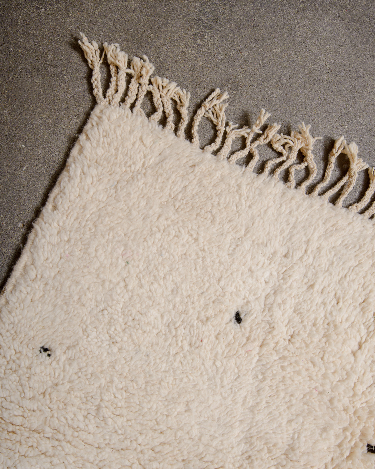 Modern, designer, handcrafted Berber rug from Morocco. Beniourain carpet with minimalist design, natural wool pile and a fluffy texture.