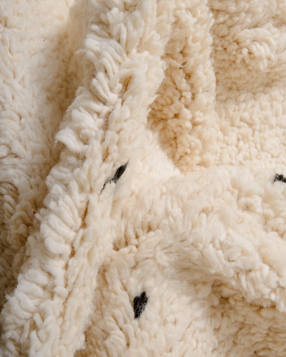 Modern, designer, handcrafted Berber rug from Morocco. Beniourain carpet with minimalist design, natural wool pile and a fluffy texture.