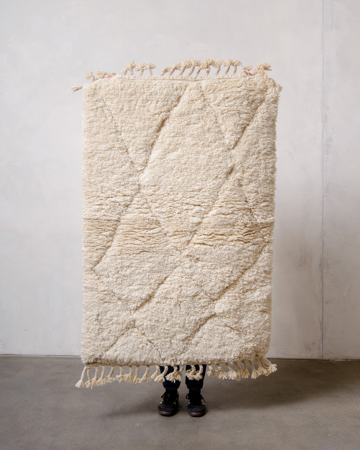 Modern, designer, handcrafted Berber rug from Morocco. Beniourain carpet with minimalist design, natural wool pile and a fluffy texture.