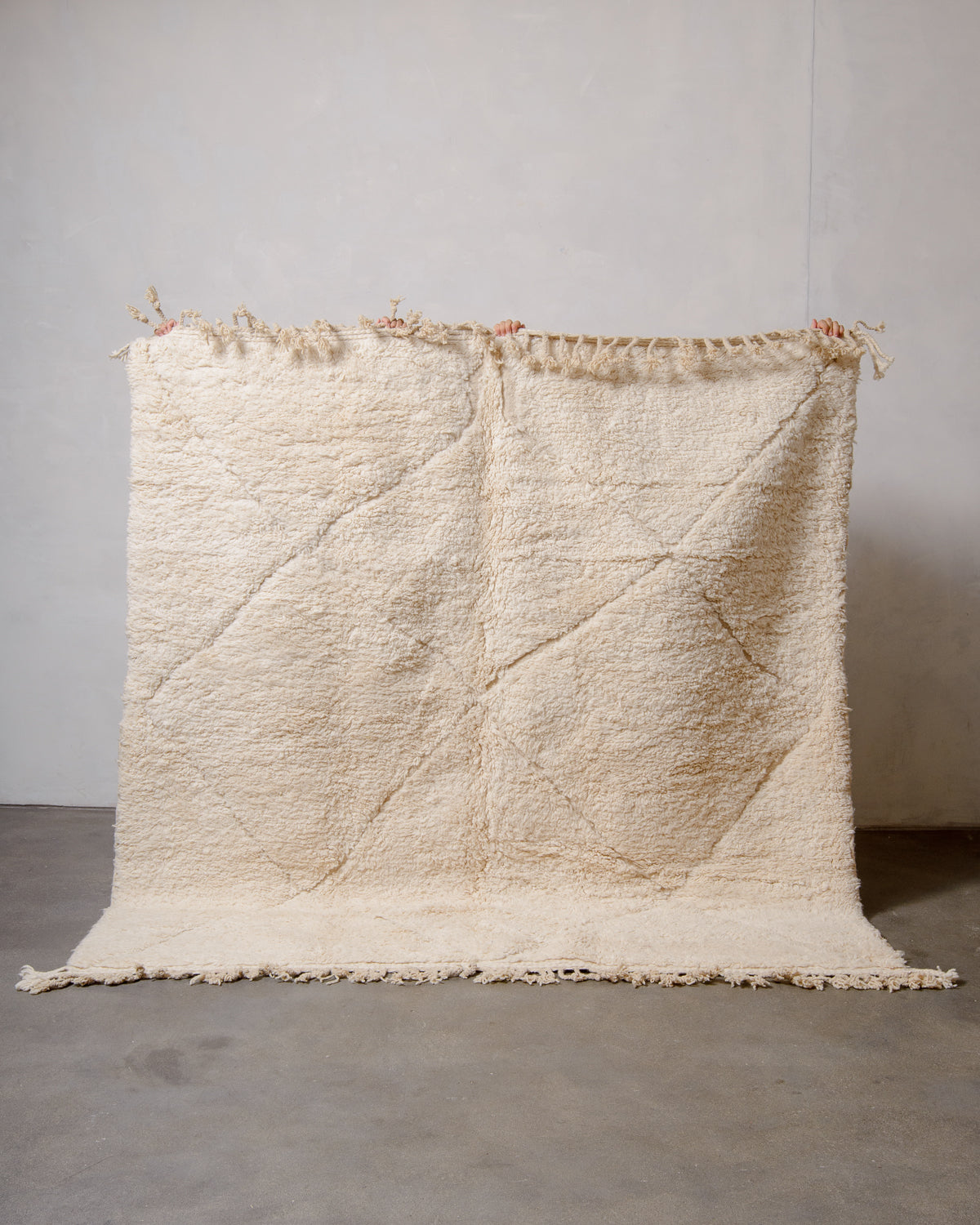 Modern, designer, handcrafted Berber rug from Morocco. Beniourain carpet with minimalist design, natural wool pile and a fluffy texture.