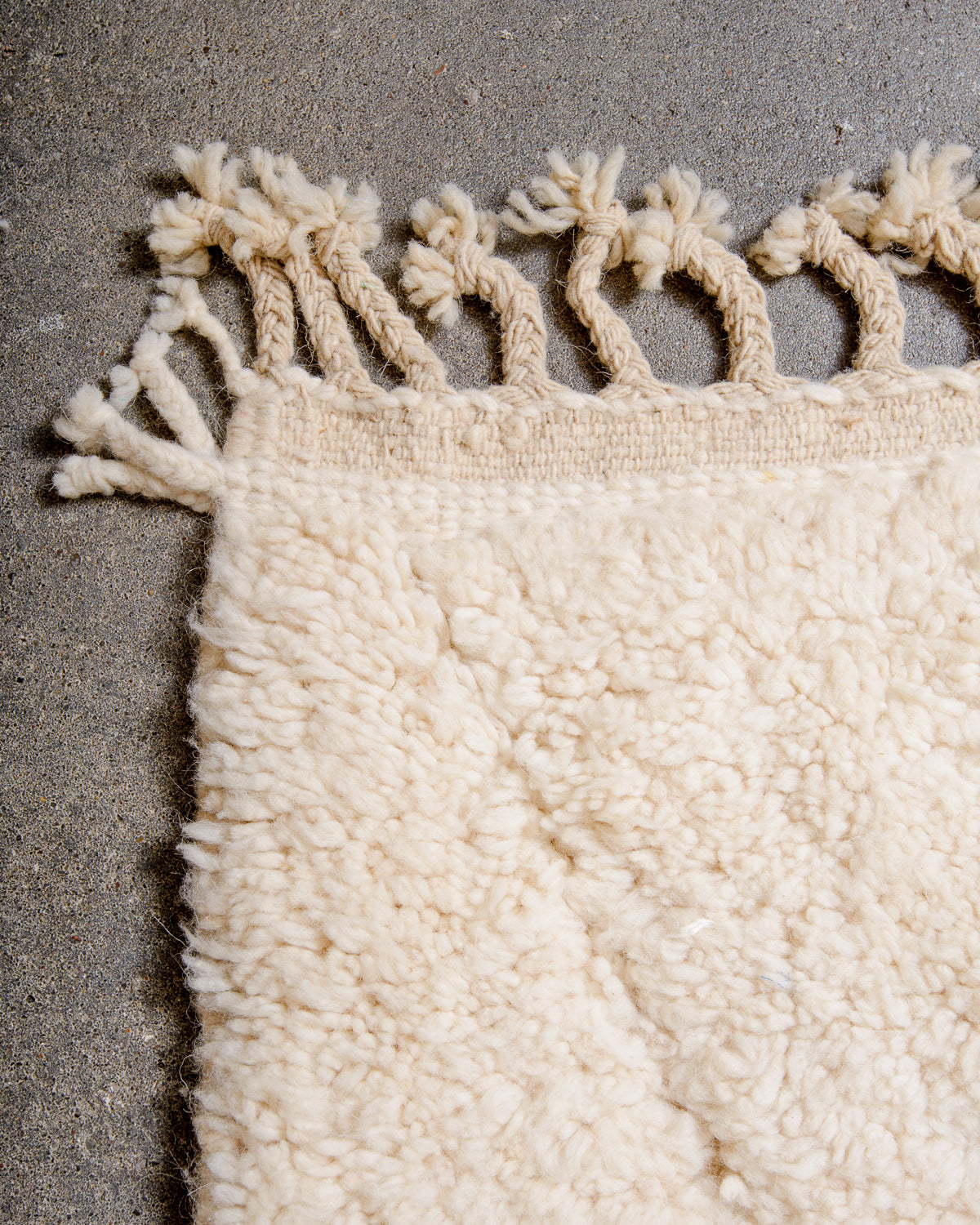 Modern, designer, handcrafted Berber rug from Morocco. Beniourain carpet with minimalist design, natural wool pile and a fluffy texture.