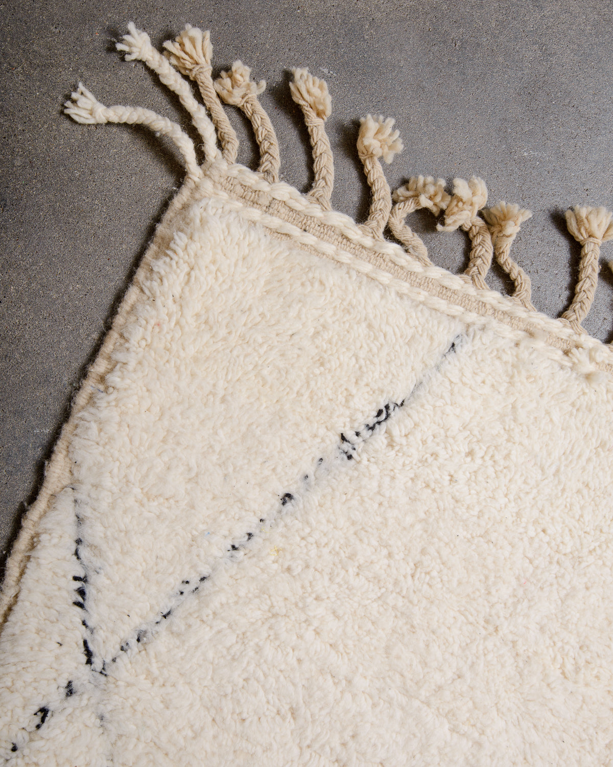 Modern, designer, handcrafted Berber rug from Morocco. Beniourain carpet with minimalist design, natural wool pile and a fluffy texture.