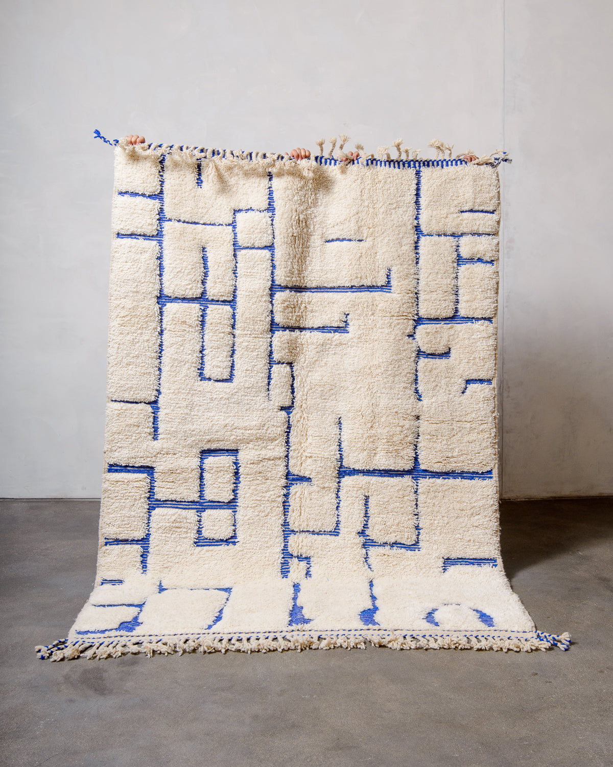 Modern, designer, handcrafted Berber rug from Morocco. Beniourain carpet with minimalist design, natural wool pile and a fluffy texture.