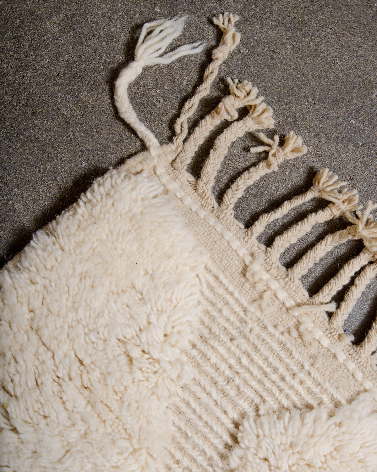 Modern, designer, handcrafted Berber rug from Morocco. Beniourain carpet with minimalist design, natural wool pile and a fluffy texture.