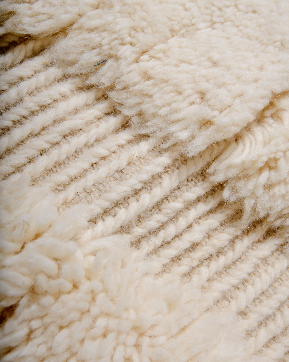 Modern, designer, handcrafted Berber rug from Morocco. Beniourain carpet with minimalist design, natural wool pile and a fluffy texture.