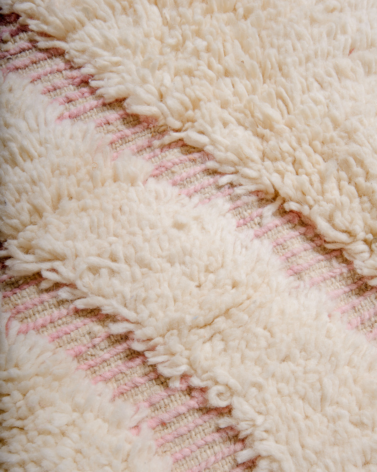 Modern, designer, handcrafted Berber rug from Morocco. Beniourain carpet with minimalist design, natural wool pile and a fluffy texture.