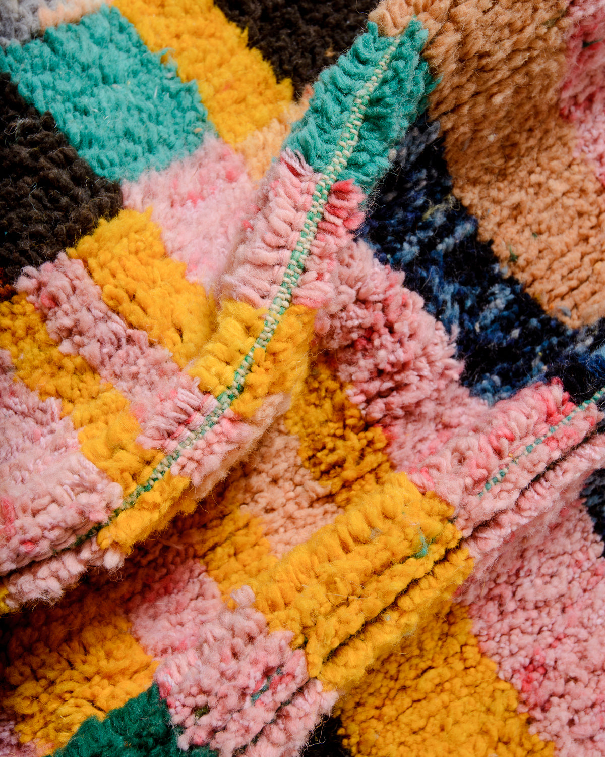 Modern, designer, handcrafted Berber rug from Morocco. Beniourain carpet with beautiful colours and patterns and fluffy wool texture.