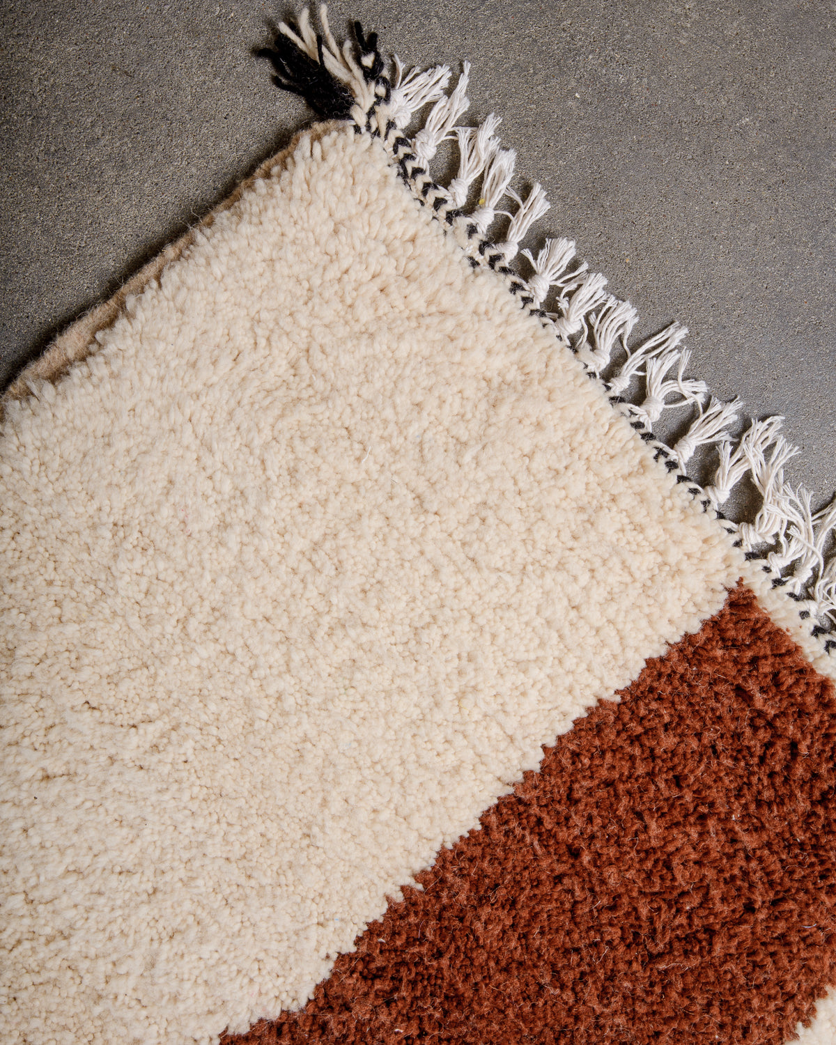 Modern, designer, handcrafted Berber rug from Morocco. Beniourain carpet with beautiful colours and patterns and fluffy wool texture.