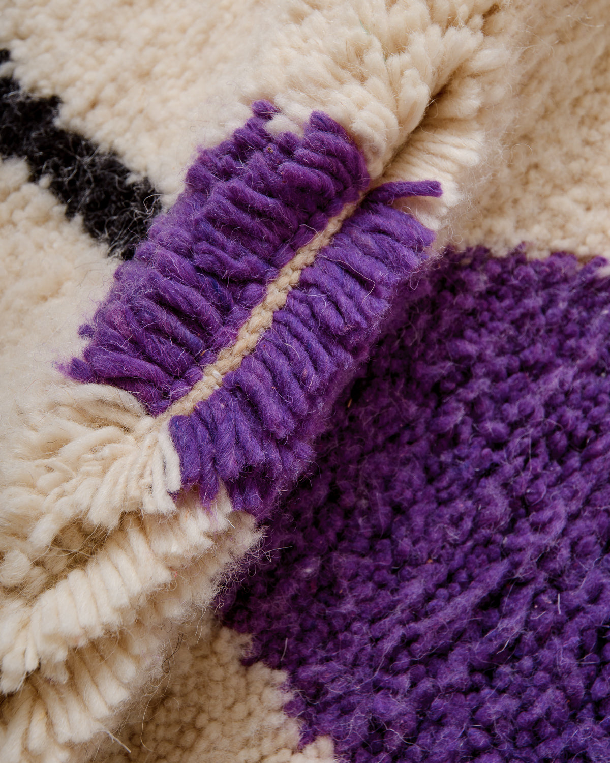 Modern, designer, handcrafted Berber rug from Morocco. Beniourain carpet with beautiful colours and patterns and fluffy wool texture.