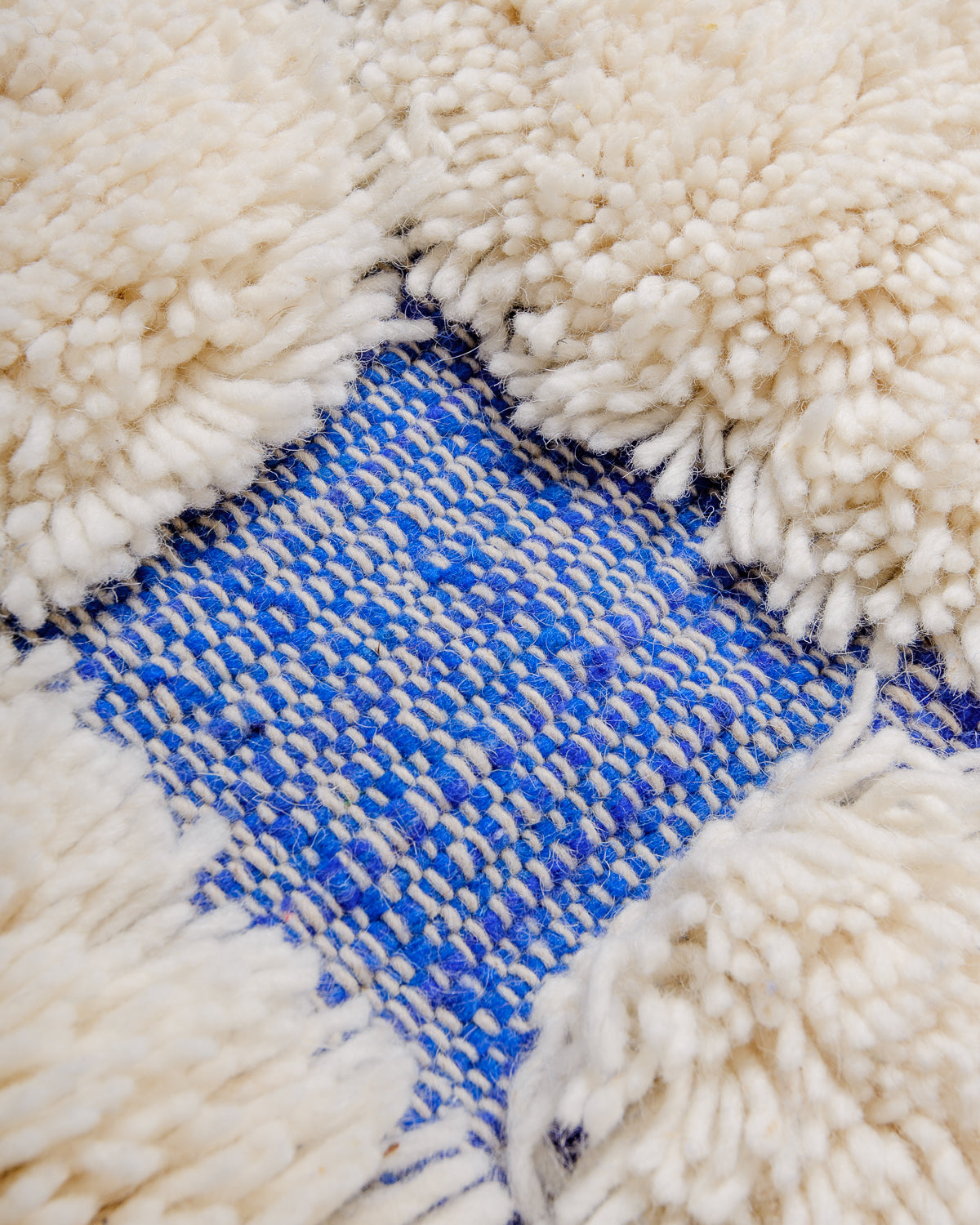 Modern, designer, handcrafted Berber rug from Morocco. Beniourain carpet with beautiful colours and patterns and fluffy wool texture.