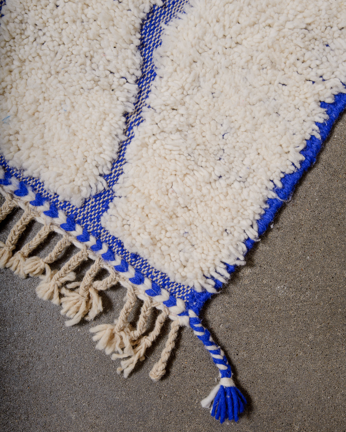 Modern, designer, handcrafted Berber rug from Morocco. Beniourain carpet with beautiful colours and patterns and fluffy wool texture.