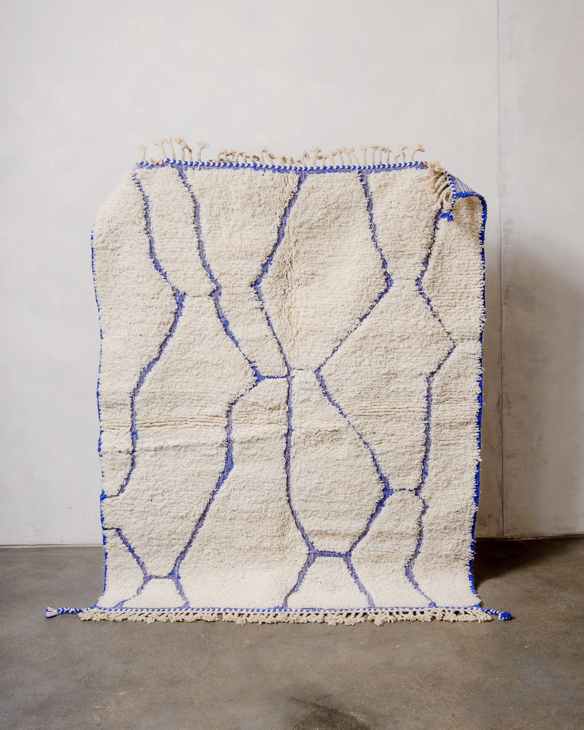 Modern, designer, handcrafted Berber rug from Morocco. Beniourain carpet with beautiful colours and patterns and fluffy wool texture.