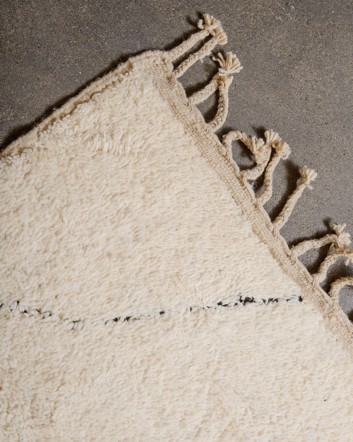 Modern, designer, handcrafted Berber rug from Morocco. Beniourain carpet with minimalist design, natural wool pile and a fluffy texture.