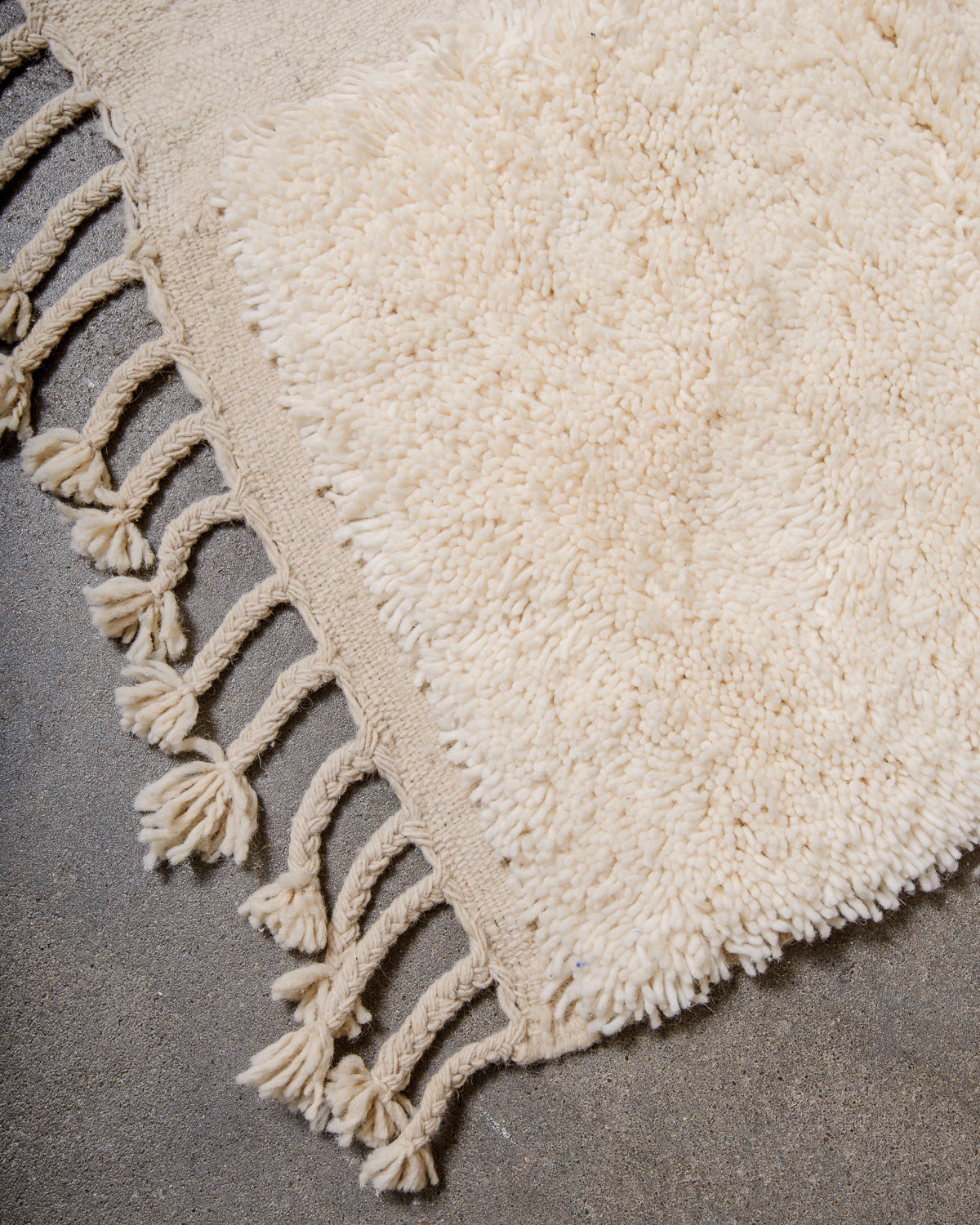 Modern, designer, handcrafted Berber rug from Morocco. Beniourain carpet with beautiful colours and patterns and fluffy wool texture.