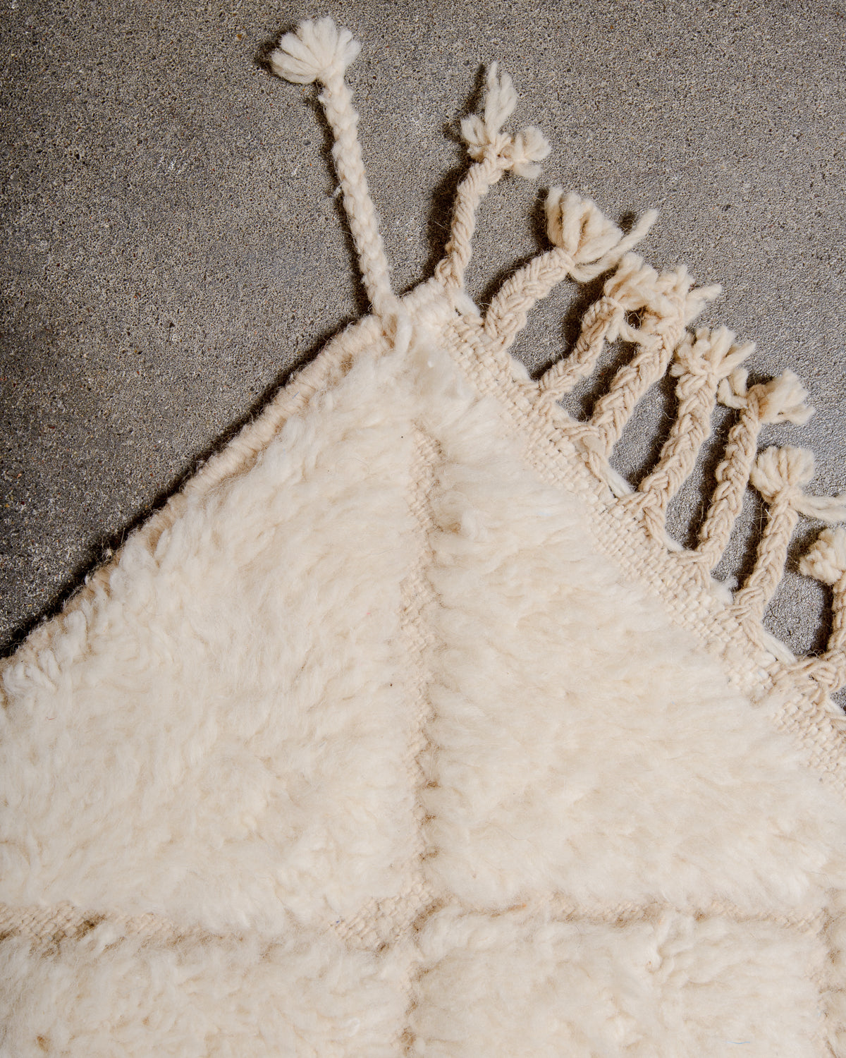 Modern, designer, handcrafted Berber rug from Morocco. Beniourain carpet with minimalist design, natural wool pile and a fluffy texture.
