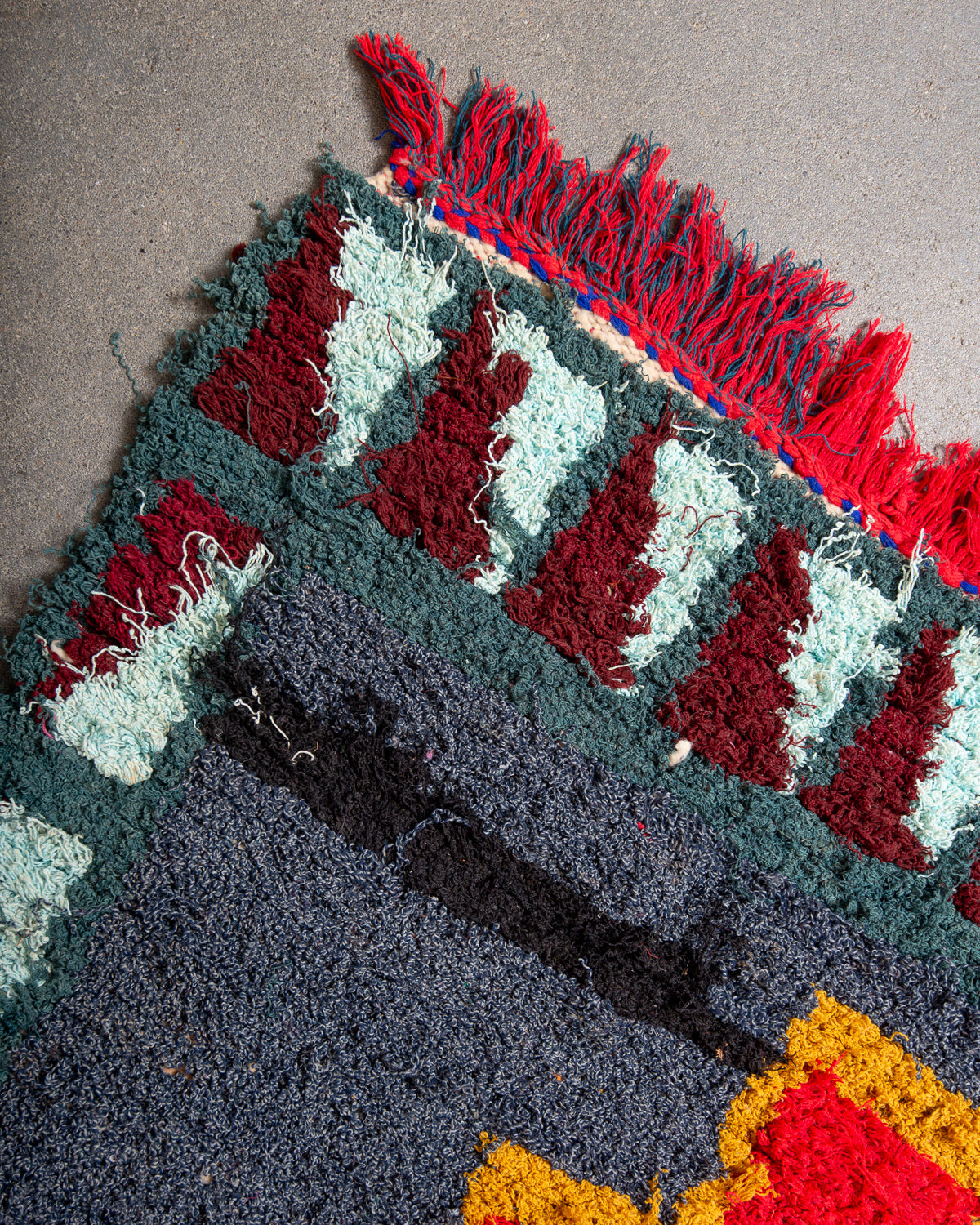 Modern designer vintage handcrafted Berber rug from Morocco. Boucherouite runner rug with beautiful colors and patterns.