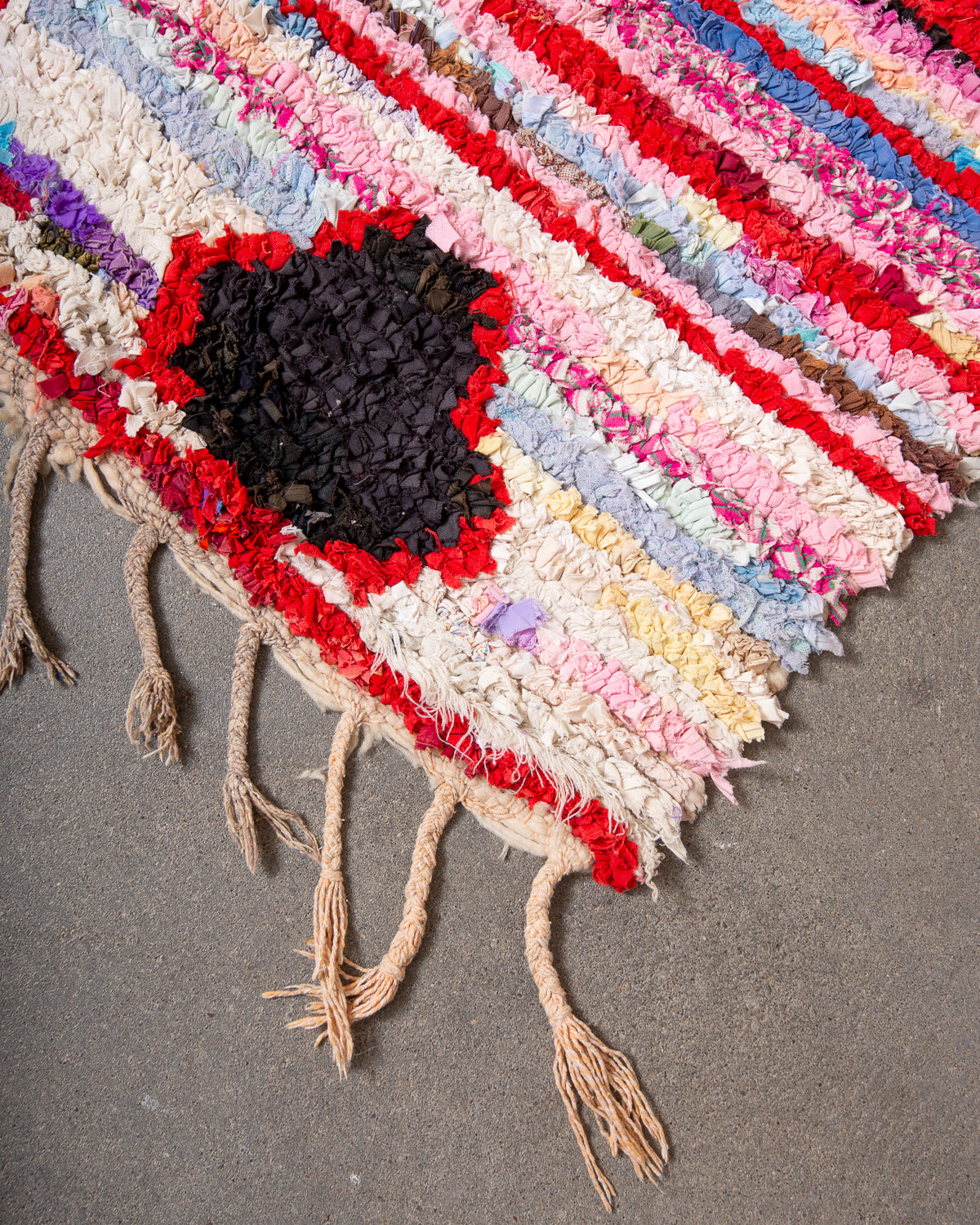 Modern designer vintage handcrafted Berber rug from Morocco. Boucherouite runner rug with beautiful colors and patterns.