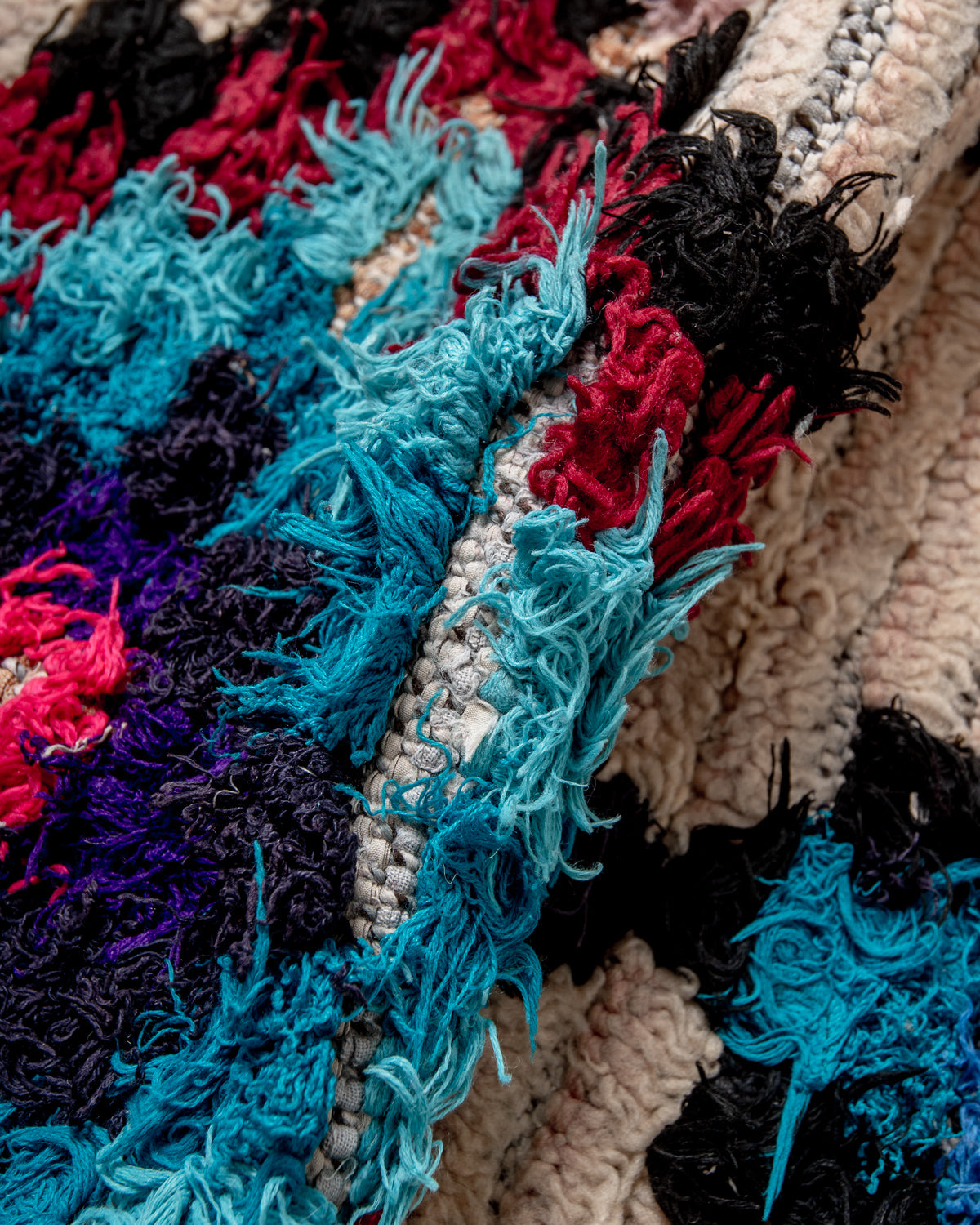 Modern designer vintage handcrafted Berber rug from Morocco. Boucherouite runner rug with beautiful colors and patterns.