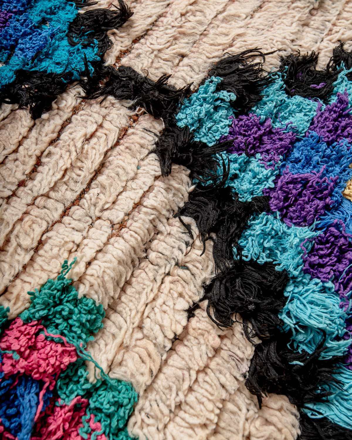 Modern designer vintage handcrafted Berber rug from Morocco. Boucherouite runner rug with beautiful colors and patterns.