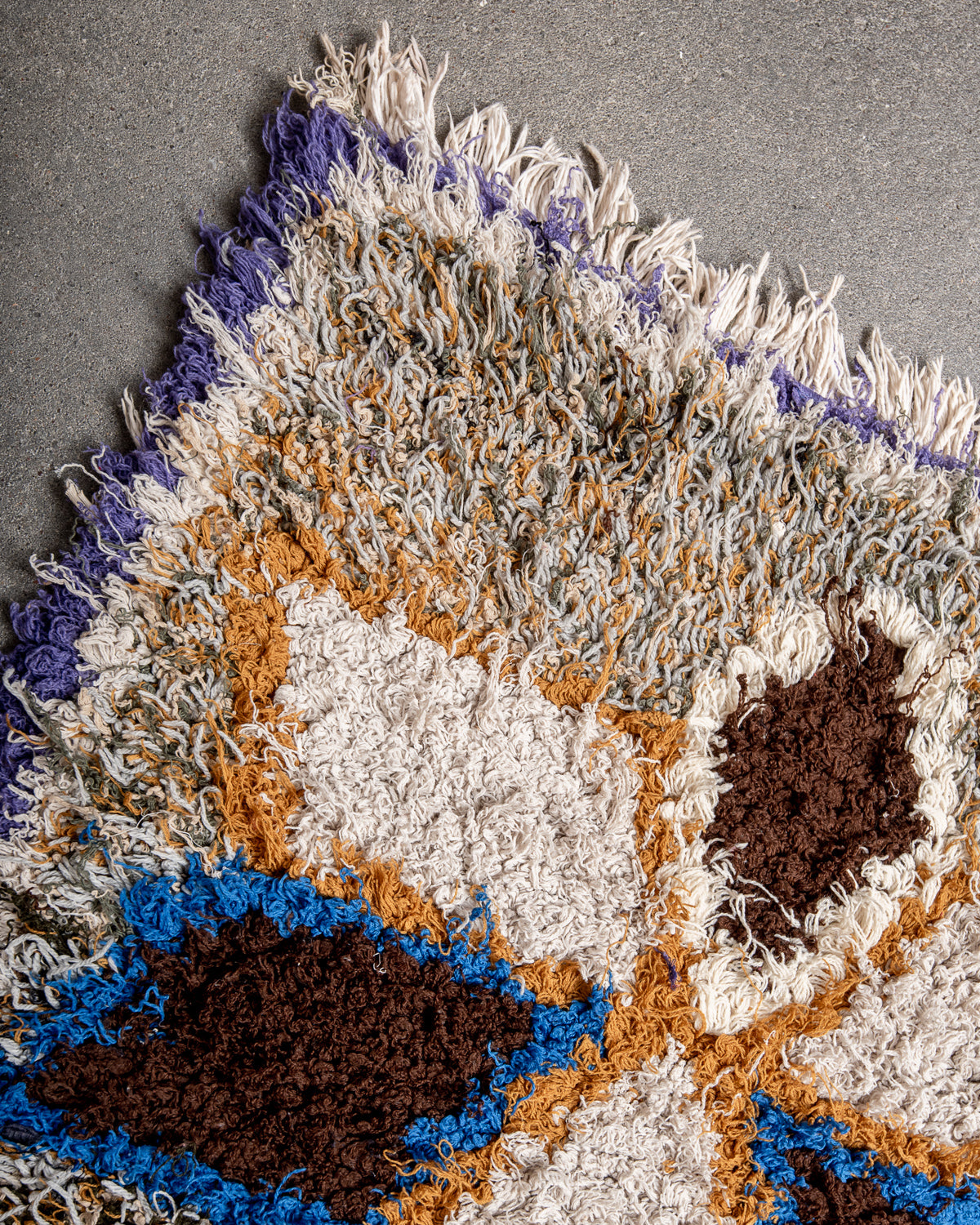 Modern designer vintage handcrafted Berber rug from Morocco. Boucherouite runner rug with beautiful colors and patterns.