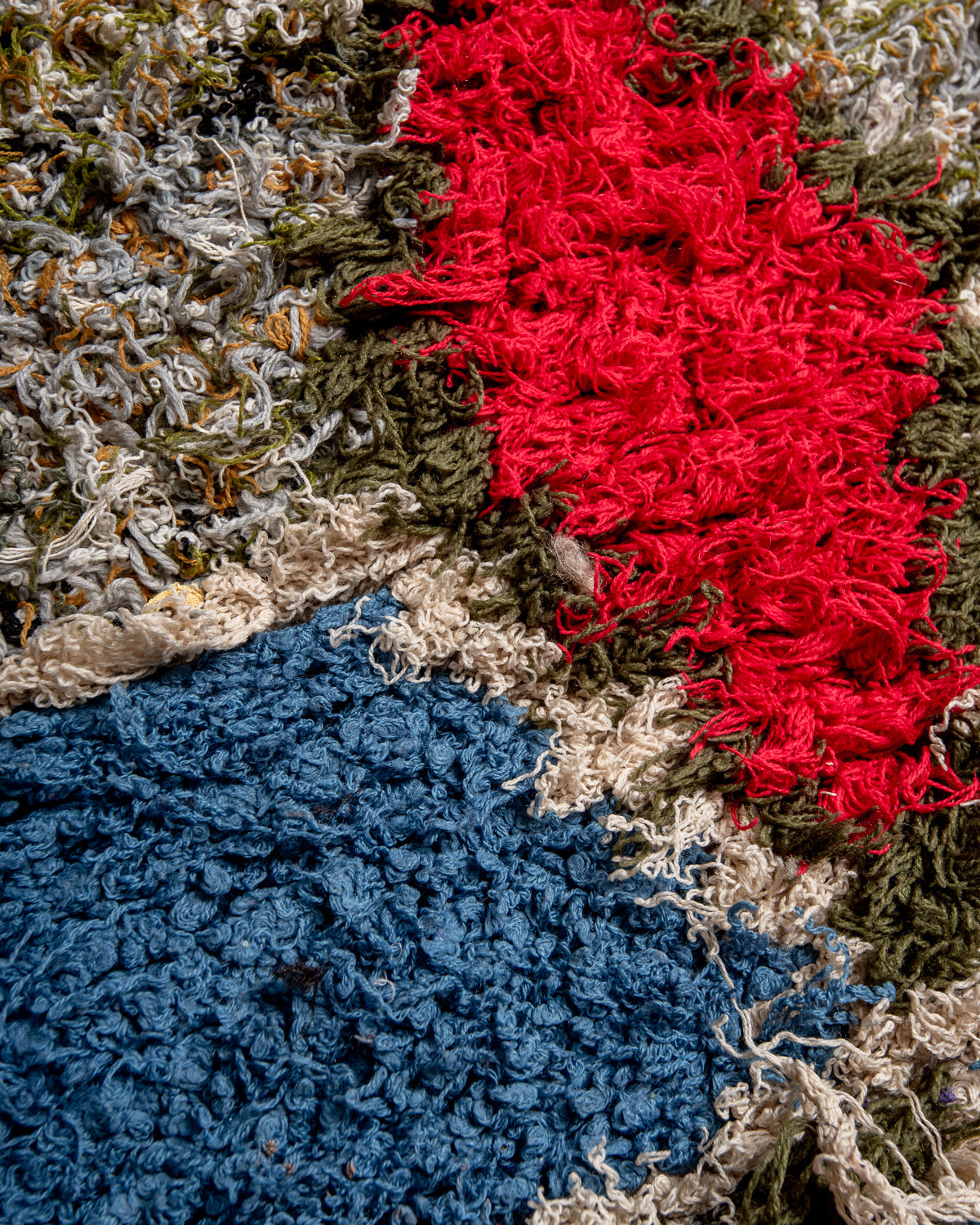 Modern designer vintage handcrafted Berber rug from Morocco. Boucherouite runner rug with beautiful colors and patterns.