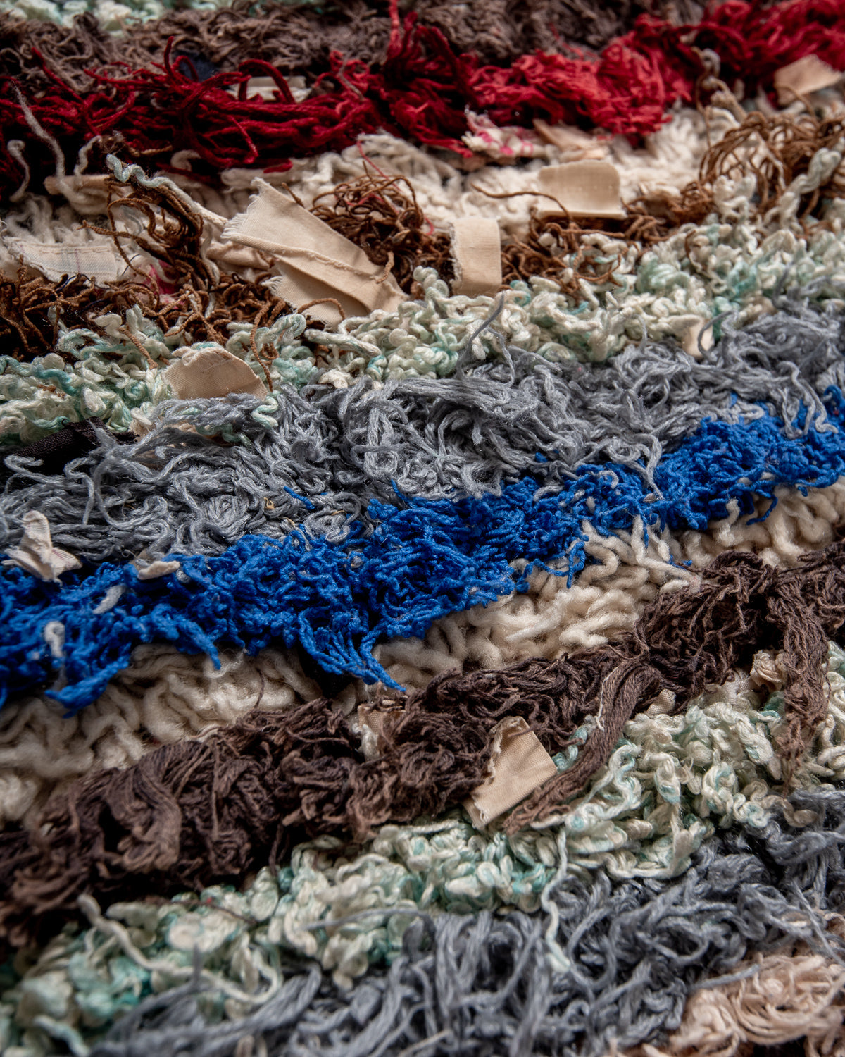 Modern designer vintage handcrafted Berber rug from Morocco. Boucherouite runner rug with beautiful colors and patterns.